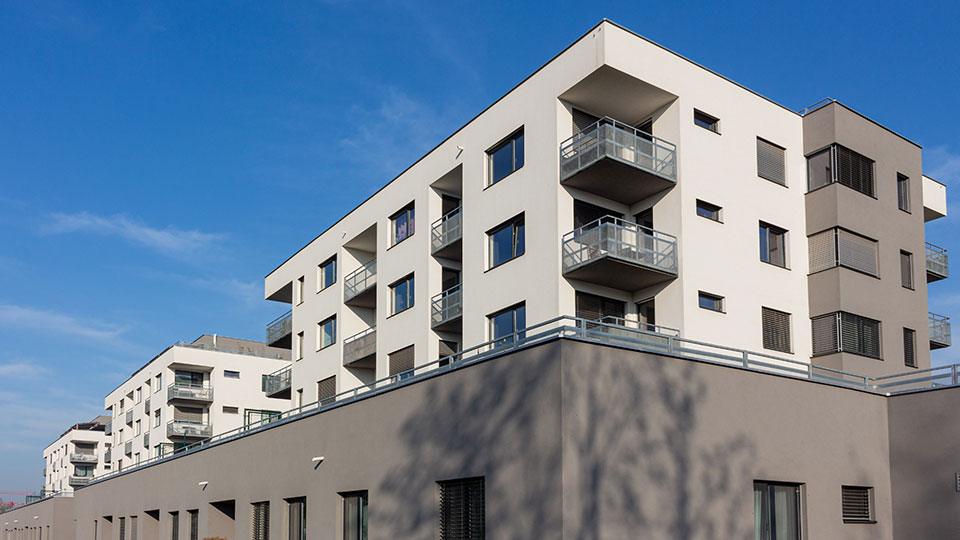 The Building Exterior Of A Condominium Complex